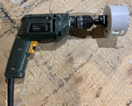 automatic hole cutter on a drill